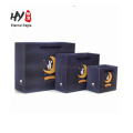 Eco-friendly black paper bag with rope handle for wholesales